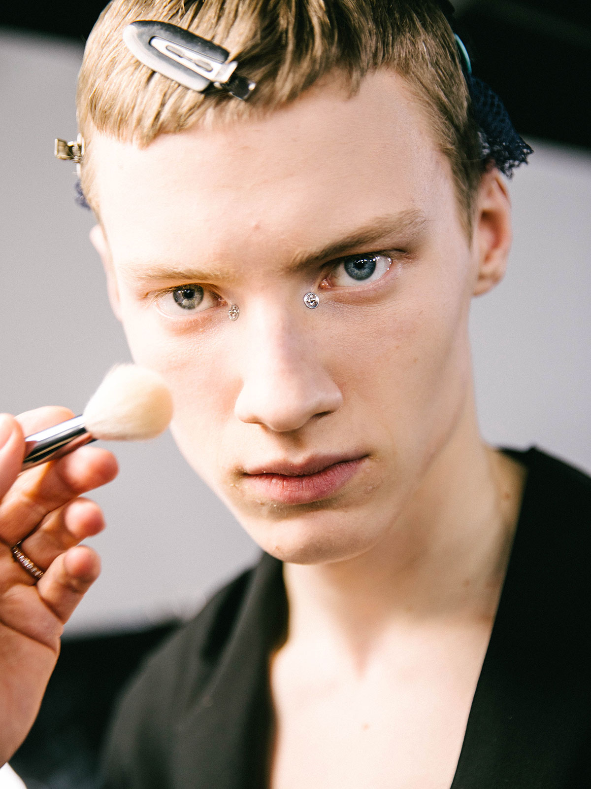 Beauty at Dior Men, where glowing skin met pseudo piercings