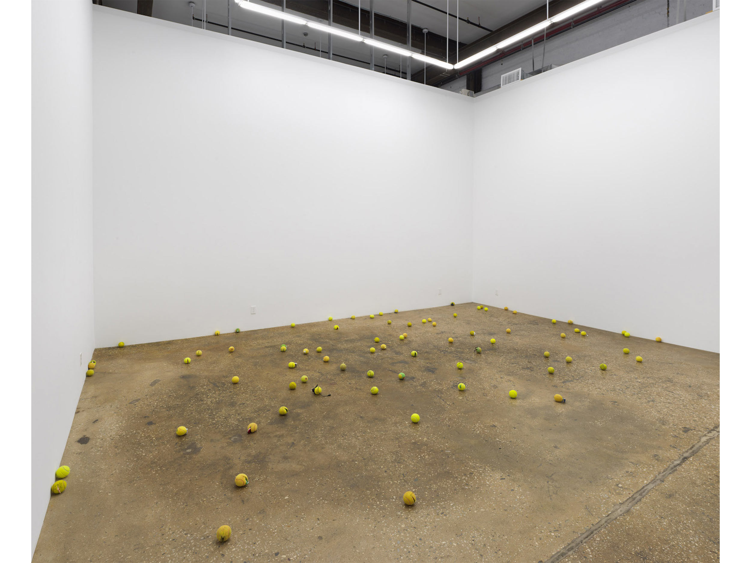 Smuggled into Claire Fontaine’s ‘Untitled (Tennis Ball Sculpture)’