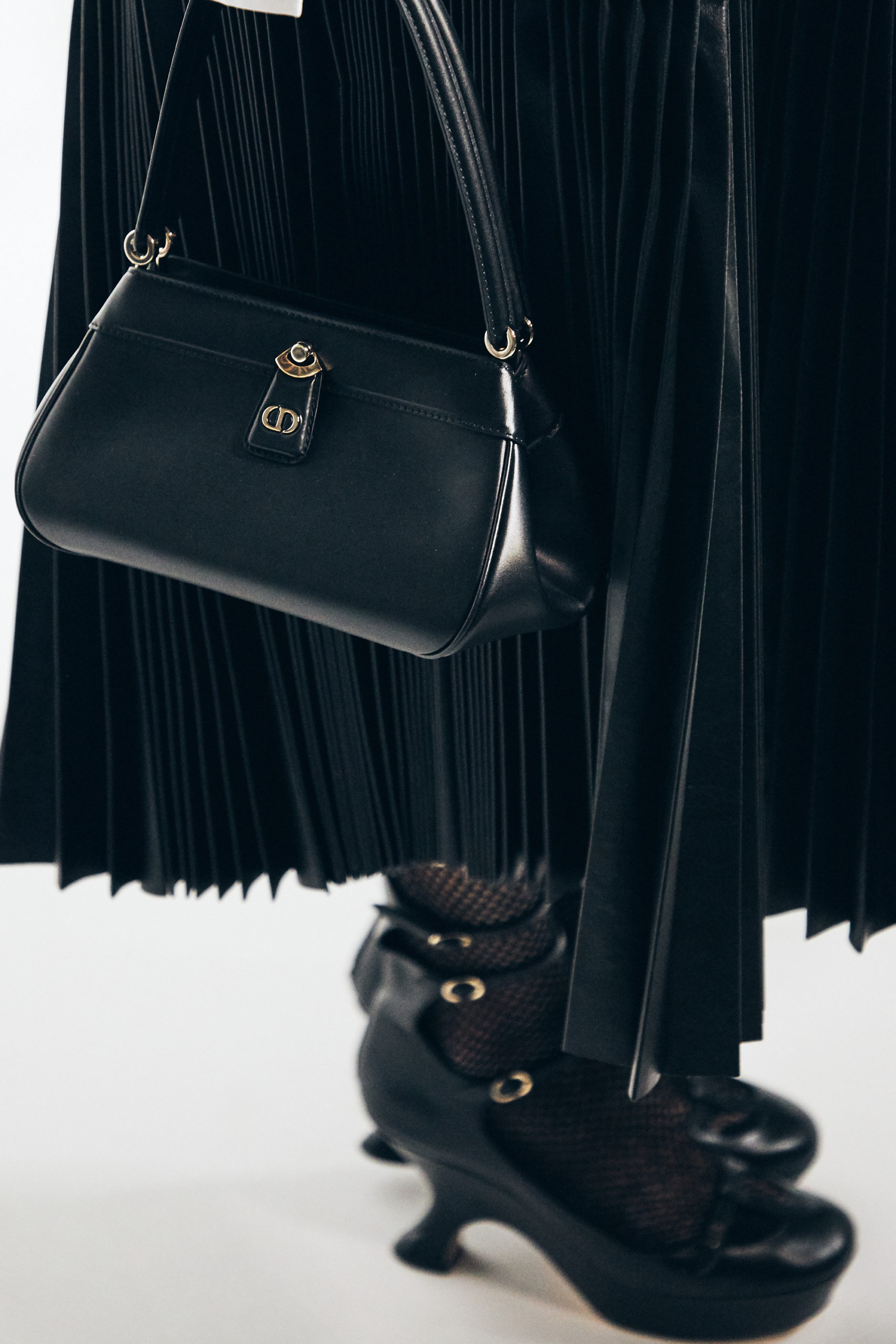 For Spring/Summer 2023, Dior subverts garments of power