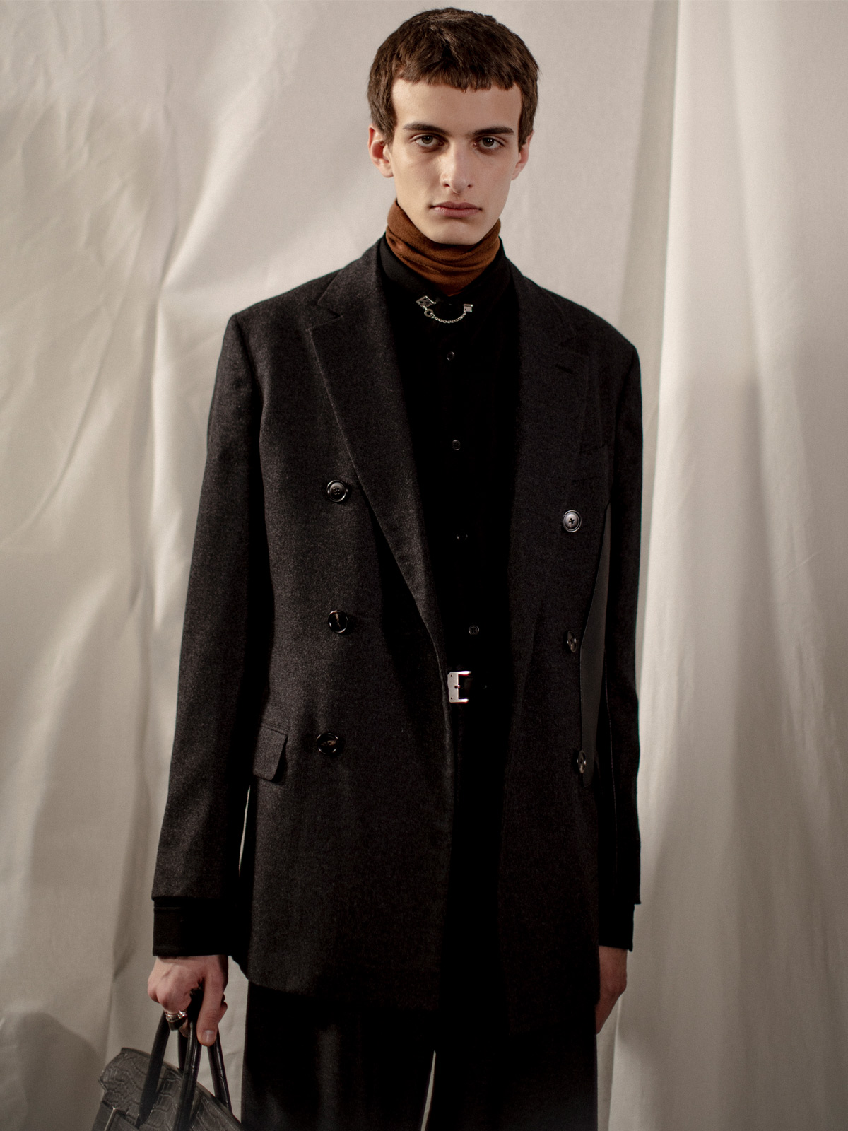 Backstage at Hermès’s Winter 2023 menswear show, where metamorphosis is subtle and steady