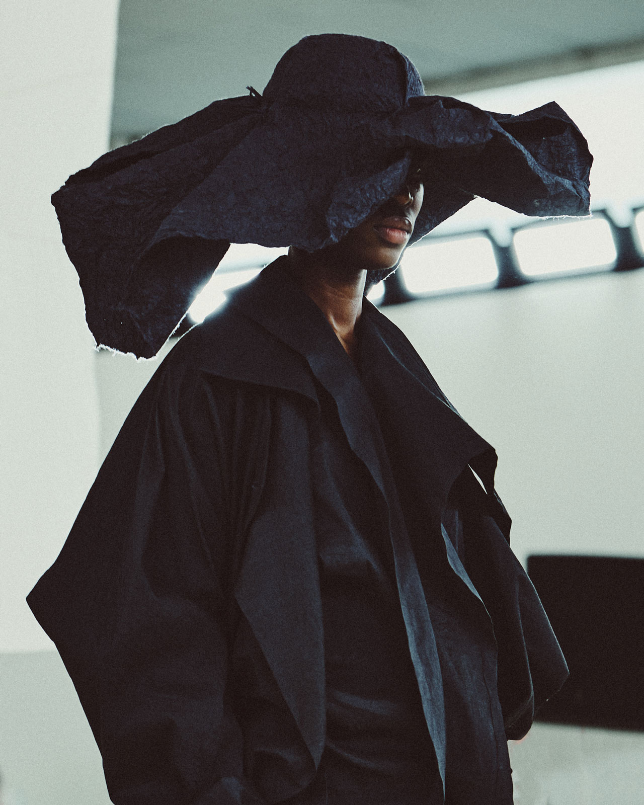 Issey Miyake materializes a quivering flame, flowing water