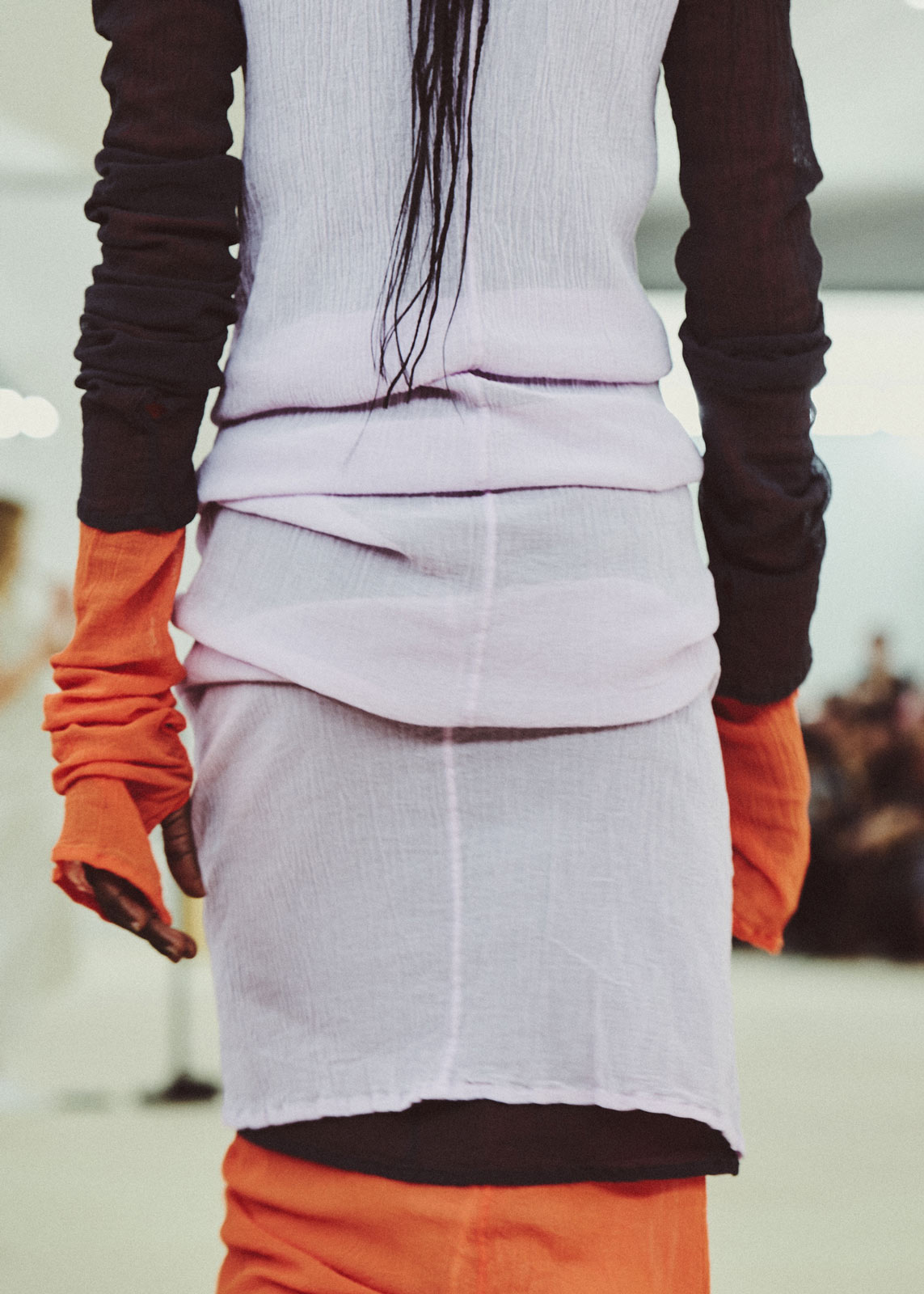 Issey Miyake materializes a quivering flame, flowing water