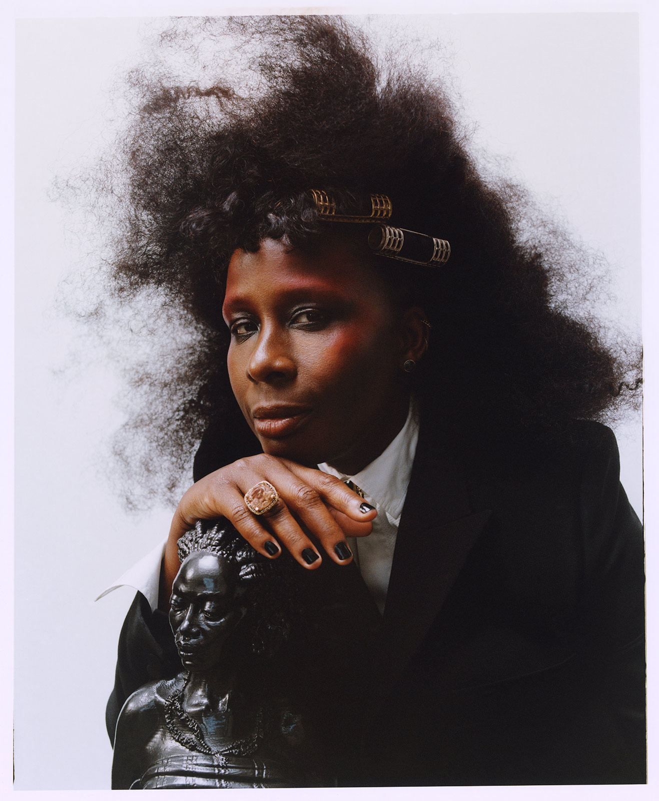 Multidisciplinary artist Mickalene Thomas transforms before the lens for her debut as the indomitable model Mickey!