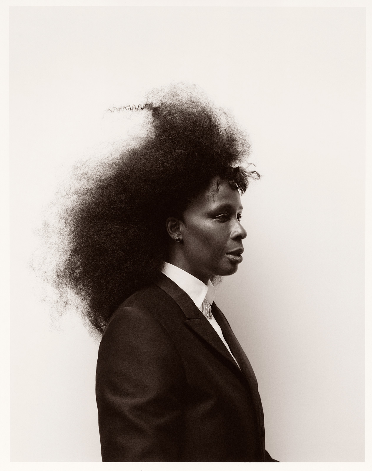 Multidisciplinary artist Mickalene Thomas transforms before the lens for her debut as the indomitable model Mickey!