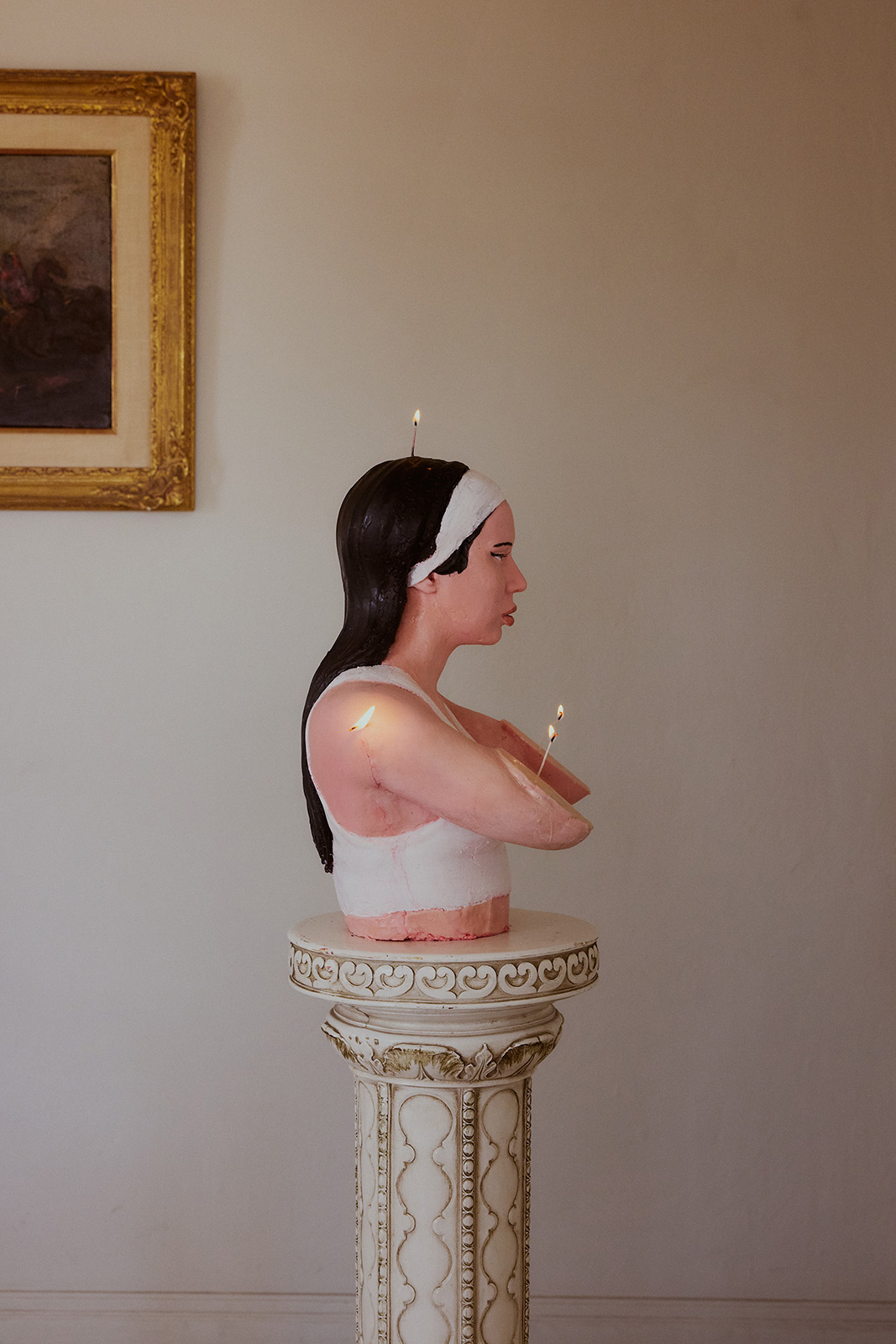 Wax, fire, and the Getty name